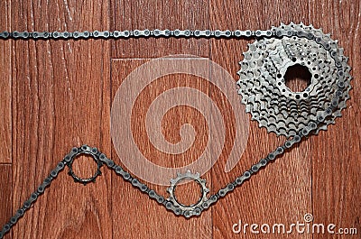 Some composition of a bicycle chain, several sprockets and other Stock Photo