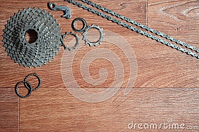 Some composition of a bicycle chain, several sprockets and other Stock Photo
