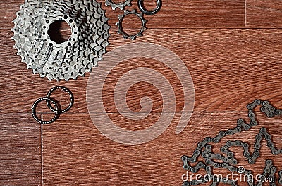 Some composition of a bicycle chain, several sprockets and other Stock Photo