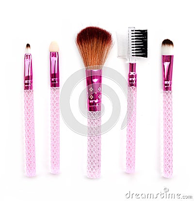 Some different kind of make-up brushes on white. Stock Photo