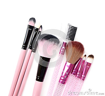 Some different kind of make-up brushes on white. Stock Photo