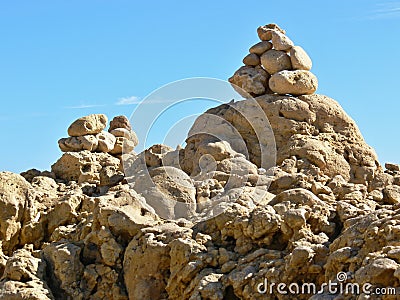 Mystical stone piles and figures on the beach in Albufeira, Algarve - Portugal Stock Photo