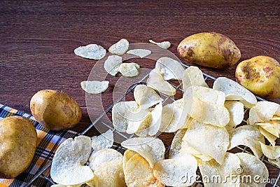 Some fresh fried potato chips Stock Photo