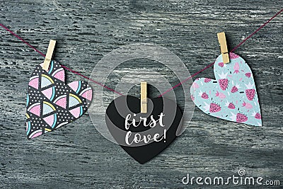 Hearts and text first love Stock Photo