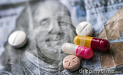 Some medications on a ticket of dollar, conceptual image copay h Stock Photo