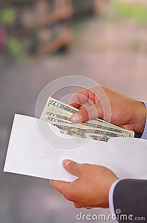 Some money inside of an envelope Stock Photo