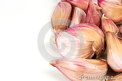 Some organic garlic cloves isolated on white background with copy space Stock Photo