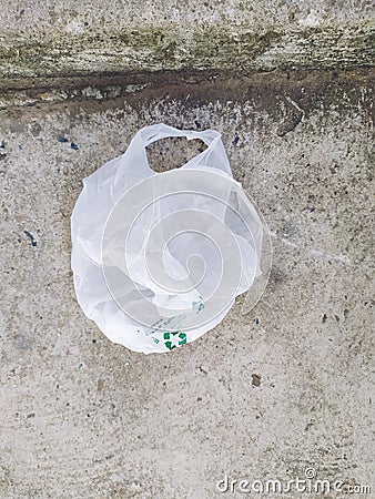 Some plastic bags can be recycled but people still left on the floor Editorial Stock Photo