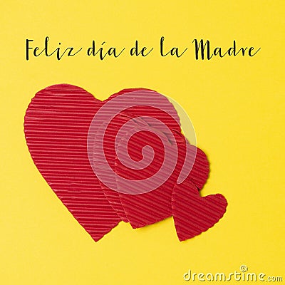Hearts and text happy mothers day in spanish Stock Photo