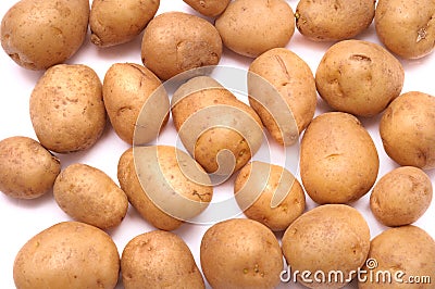 Some small brown yellow potatoes Stock Photo