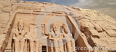 Stone carvings of pharaohs adorning the majestic wall Editorial Stock Photo