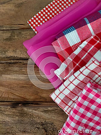 Some of table clothes on wood background Stock Photo