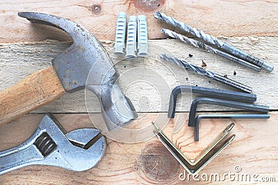 Some tools on a wooden desktop in a workshop. DIY and bricolage concept. Stock Photo
