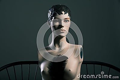 Some topless female mannequin with pen Stock Photo