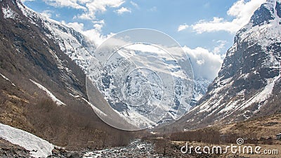 Snow at the mountaintops in Norway Stock Photo