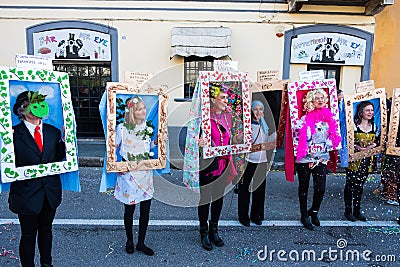 Some women are disguised as famous paintings at the Carnival parade Editorial Stock Photo