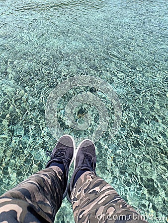 Stand and walk on the water surface Stock Photo