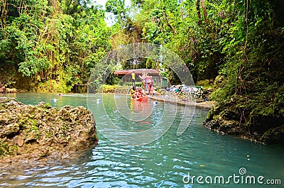 Somerset Falls - a waterfall and blue lagoon in Port Antonio, Jamaica Editorial Stock Photo