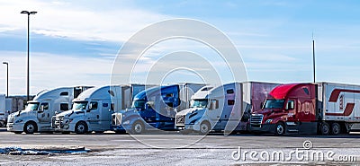 Sommerset, Pennsylvania,USA February 5, 2023 Five 18 wheeler freight trucks lined up Editorial Stock Photo