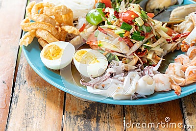 Seafood papaya salad dish Stock Photo