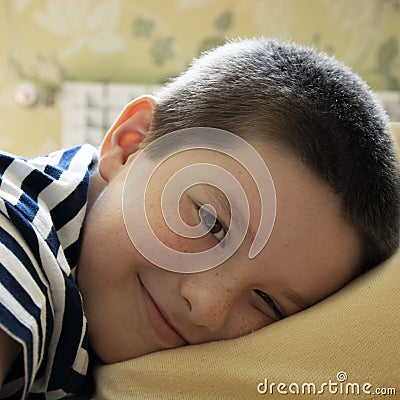 Son lay down to rest Stock Photo