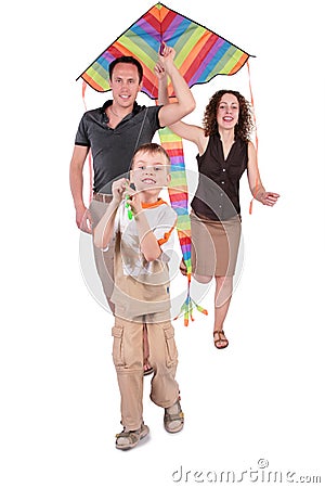 Son and parents start kite Stock Photo