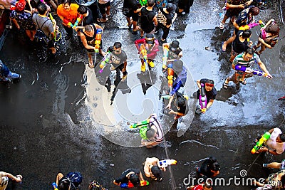 Songkran Festival crowded with Thai people and tourists on Silom Road, Bangkok, Thailand Editorial Stock Photo