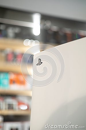 Sony PlayStation 5 in a brightly lit retail store, on a table Editorial Stock Photo