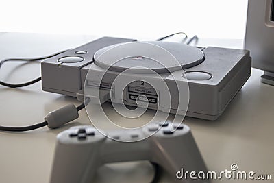 A sony Playstation one and controller a games console released in 1994 by sony Editorial Stock Photo