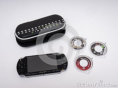 Sony`s famous PSP Playstation Portable video game console in black Editorial Stock Photo