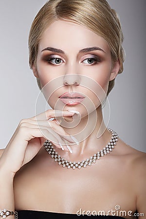 Sophisticated Aristocratic Posh Lady with Pearly Necklace Stock Photo