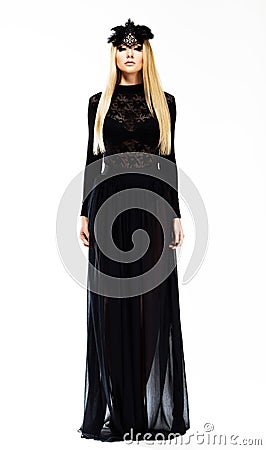 Sophisticated Elegant Blonde in Evening Black Dress and Headwear with Feathers. Art Design Stock Photo