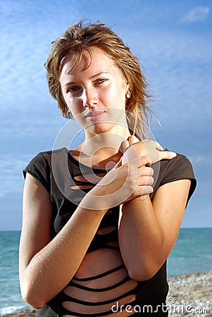 Sophisticated lady on a beach Stock Photo