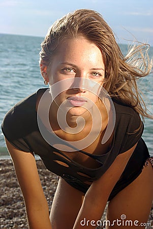 Sophisticated lady on a beach Stock Photo