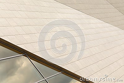 Sophisticating modern roof facade design. Surface with horizontal lines and window with sky reflection. Stock Photo