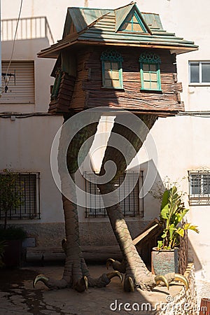 SOPORTUJAR, SPAIN - 16 MAY 2022 The house of the witch Baba Yaga on crow's feet in the tiny mountain village of Soportujar Editorial Stock Photo