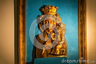 SOPOT, POLAND - DECEMBER 20, 2017: Interior of in the Garrison Church of St George. The wooden relief of the Virgin Mary by Editorial Stock Photo