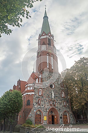 Saint George Church and Saint Adalbert wayside shrine Editorial Stock Photo