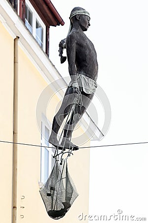 Sopot, Poland. Sculpture of the fisherman between living houses Editorial Stock Photo