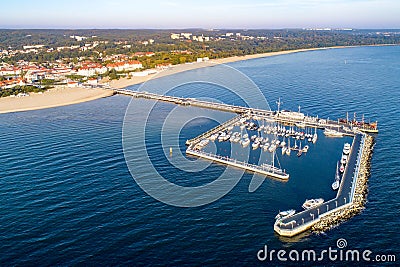 Sopot resort in Poland with pier, marina yachts and beach. Aeri Stock Photo