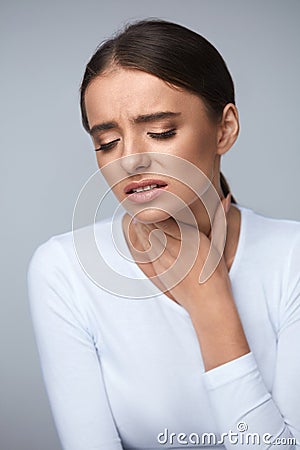 Sore Throat. Sick Woman Suffering From Pain, Painful Swallowing. Stock Photo