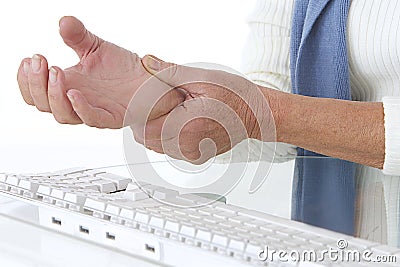 Sore wrist - occupational disease Stock Photo