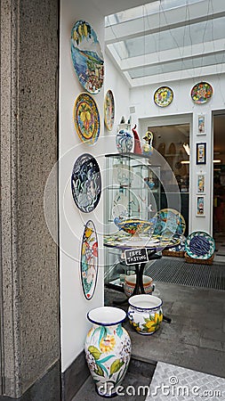 Sorrento, Italy - May 23, 2023: Traditional ceramic plates in souvenir shop in Sorrento at Italy Editorial Stock Photo