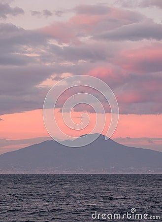 Sunset in the Bay of Naples, Italy. Mount Vesuvius can be seen on the horizon. Photographed near Sorrento . Stock Photo