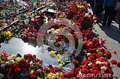 Sorrowful Maidan filled with flowers and candles Editorial Stock Photo