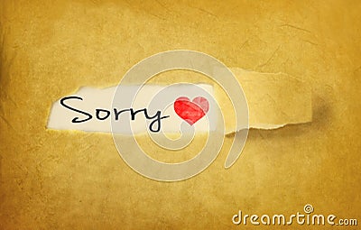 Sorry handwritten on vintage paper Stock Photo