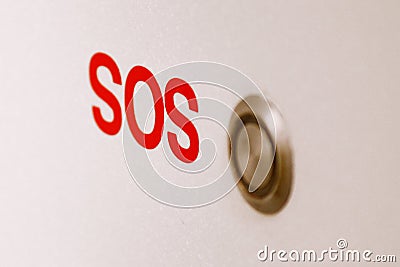 SOS bathroom panic button on the wall Stock Photo