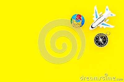 SOS Save the planet concept with the earth, plane and compass on white background flat lay mock up Stock Photo