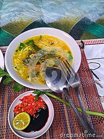 Soto daging or indonesian beef yellow sup Stock Photo