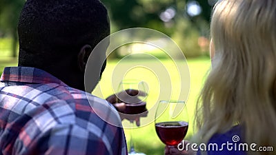 Soulmates with wineglasses discussing future plans, happy relationship, marriage Stock Photo